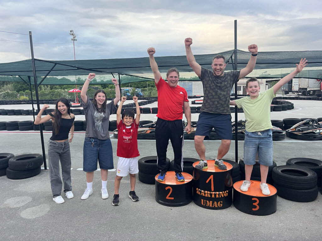 Winners celebrating on podium